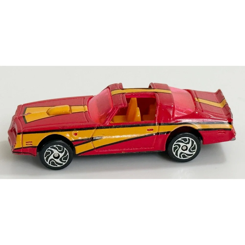 Racing Champions 1979 Pontiac Firebird Trans Am Kids 1/64 Red Yellow Stripes